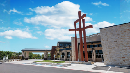 Southcrest Baptist Church exterior with three crosses and stone facade, an example of community church architecture.